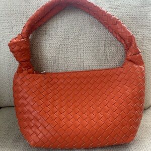 Woven coral orange shoulder bag